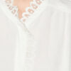 Estela-bluse i ensfarget krepp med engelsk broderi
