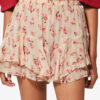 Flytende shorts i trykt musselin