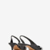 Padim høyhælte slingback-pumps i lakkskinn