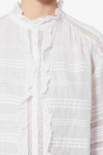 Peline bomullsbluse med blomsterblonder Peline bomullsbluse med blomsterblonder