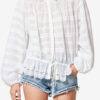 Polly bomullsbluse med blomsterblonder Polly bomullsbluse med blomsterblonder