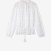 Polly bomullsbluse med blomsterblonder Polly bomullsbluse med blomsterblonder